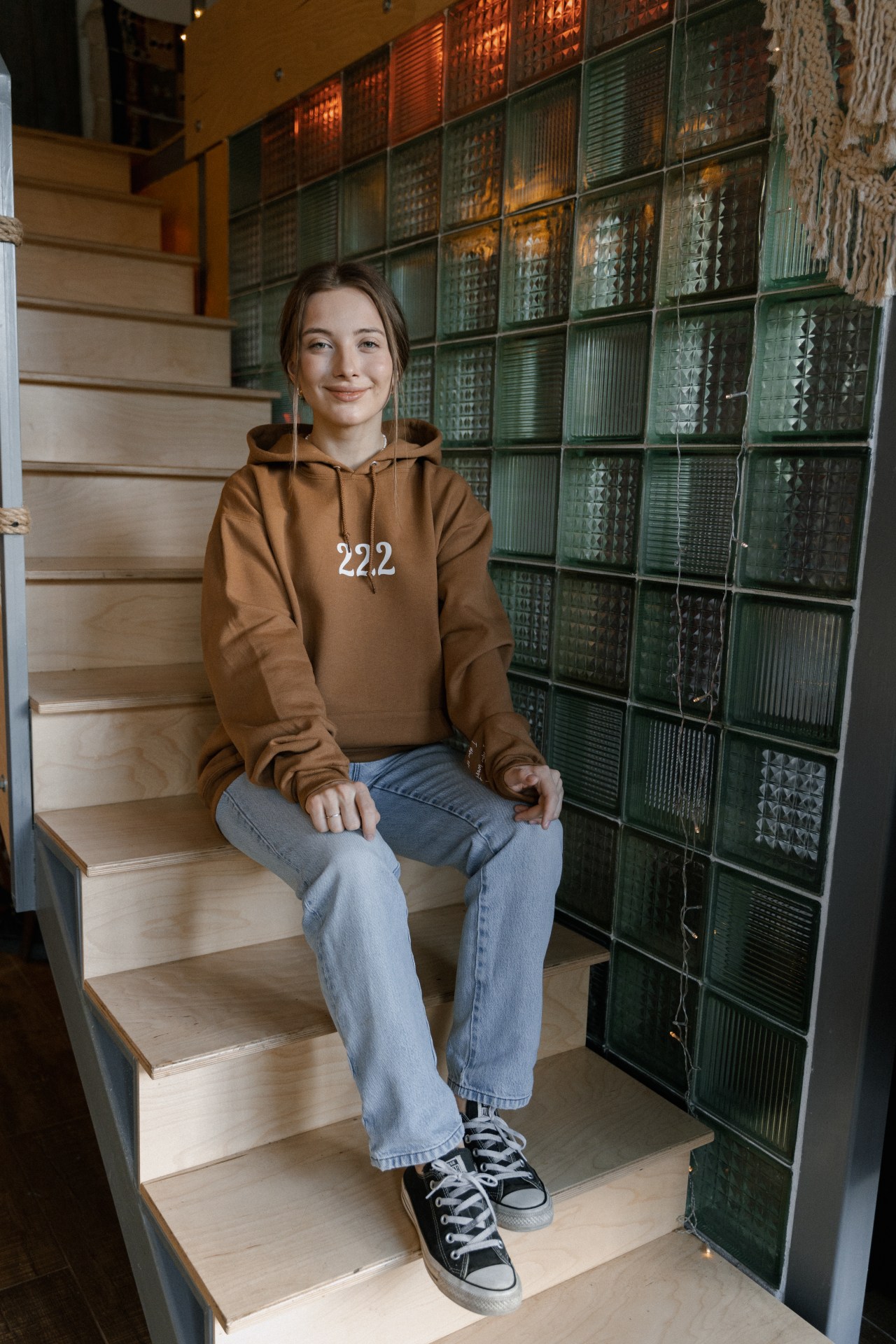 Girl Smiling in Sweatshirt