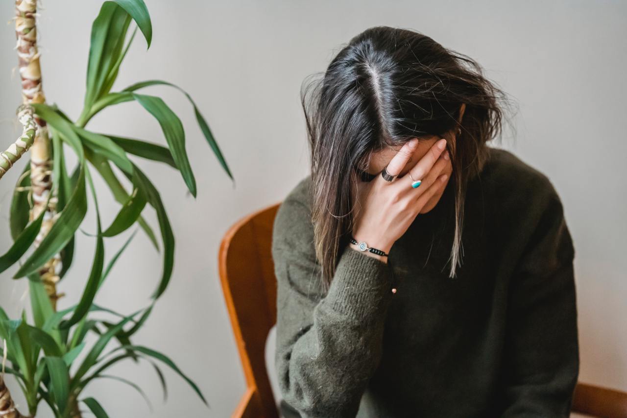 Woman With Head Down