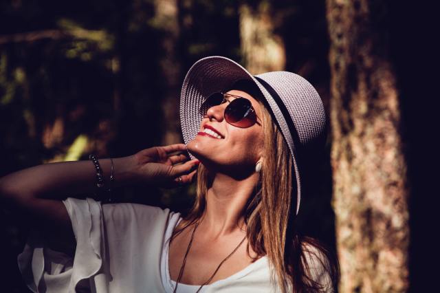 Woman Smiling and Looking Up