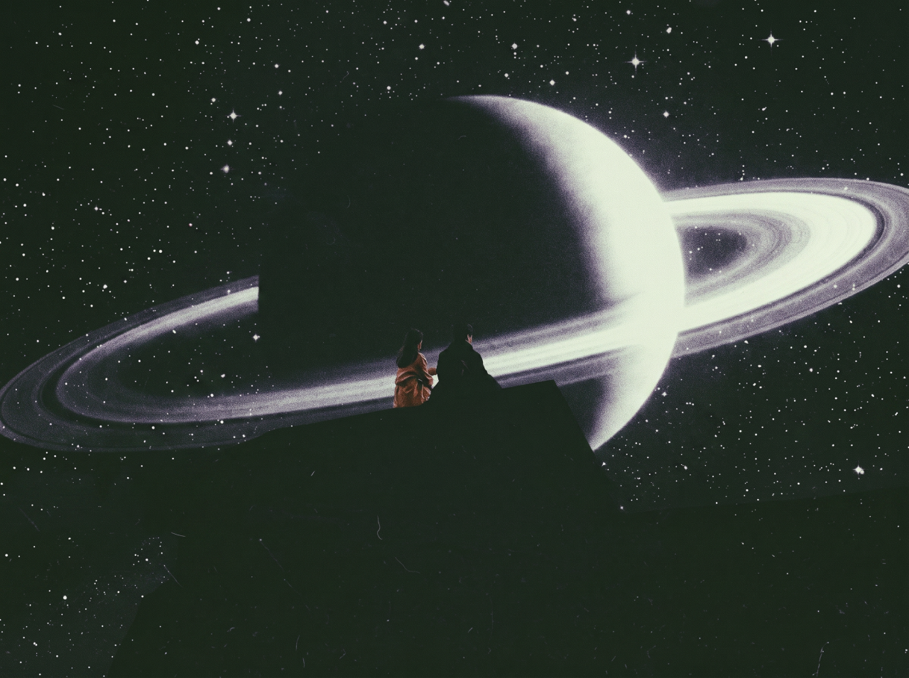 Two silhouetted people facing each other in front of a large glowing image of Saturn with rings and a starry background.